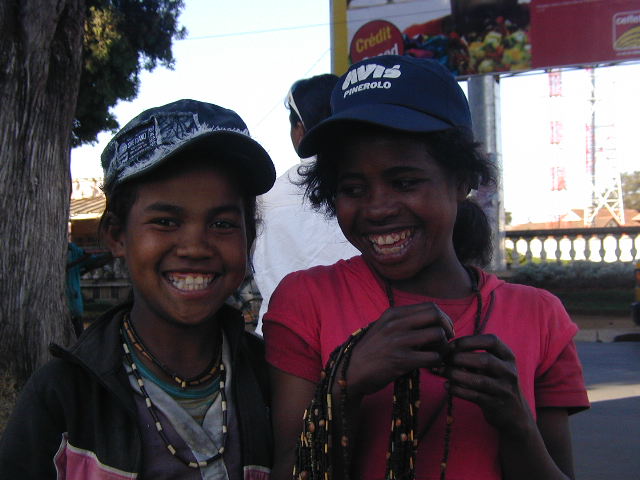 girls selling necklaces