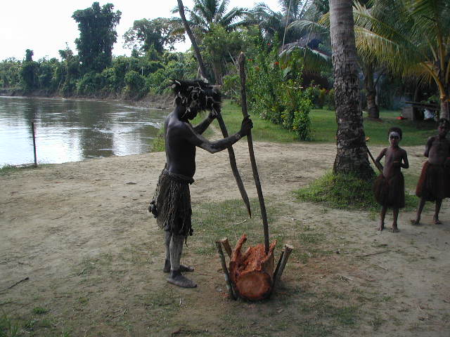 man splitting sago