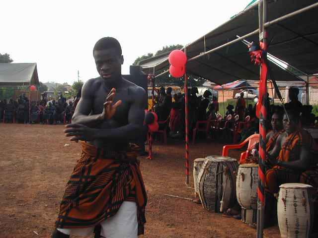 boy dancing at funeral